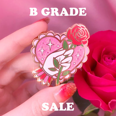 B SALE - HAND HOLDING ROSE